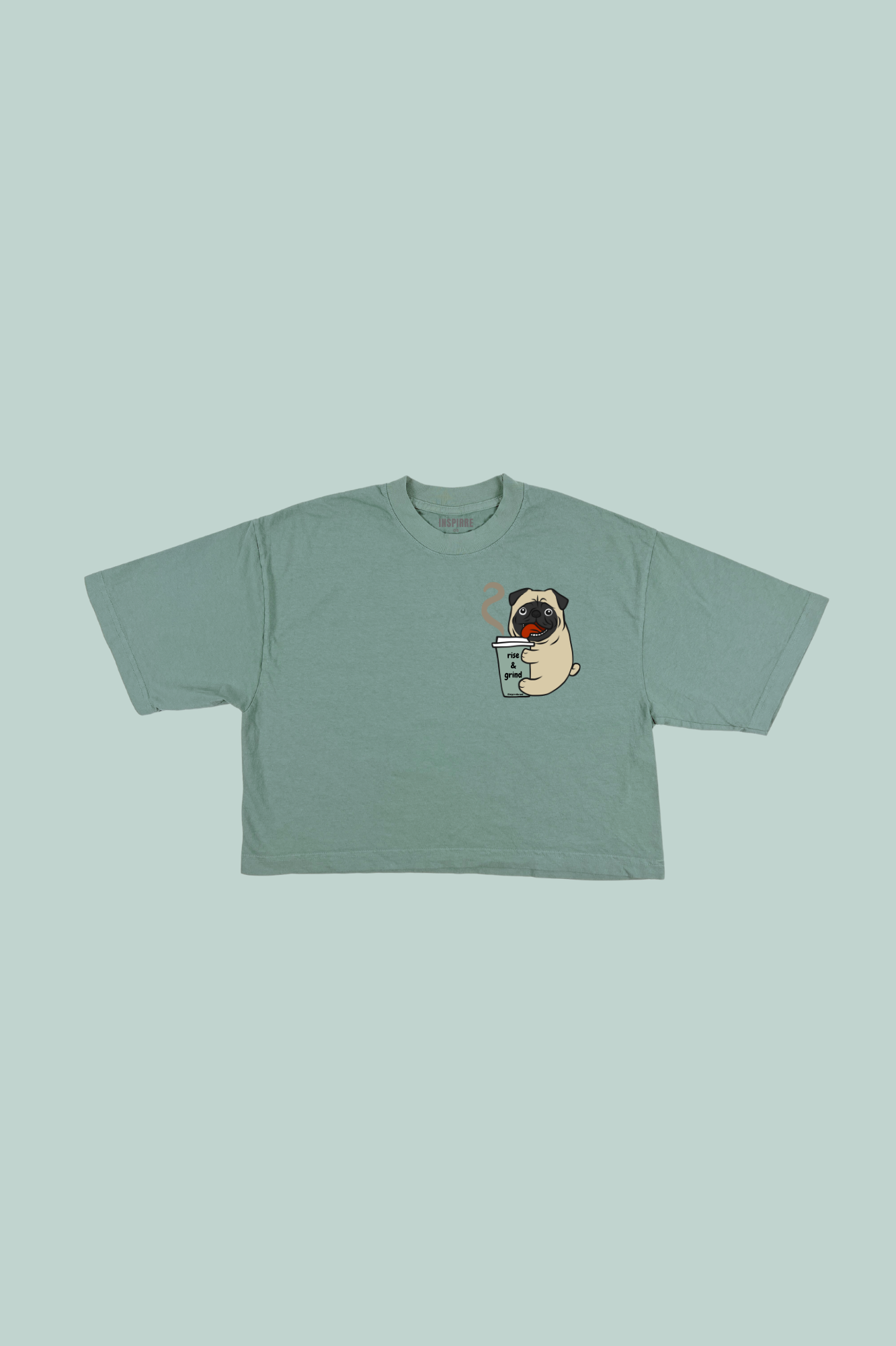 Rise and Grind crop tee in atlantic green with pug holding coffee design - oversized garment-dyed crop top for women