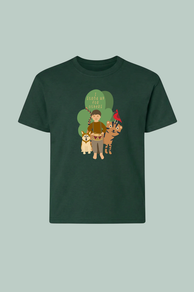 Dark green t-shirt with a graphic of a drummer boy with animals in the background and text I stand up for others