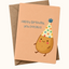 A cute birthday card and envelope set. The peach-colored card features a smiling potato character wearing a colorful party hat and the text 'Happy Birthday, you potato!'.
