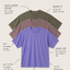 Three INSPIRRE premium garment dyed t-shirts in olive, mauve, and purple with text describing features of the shirt.