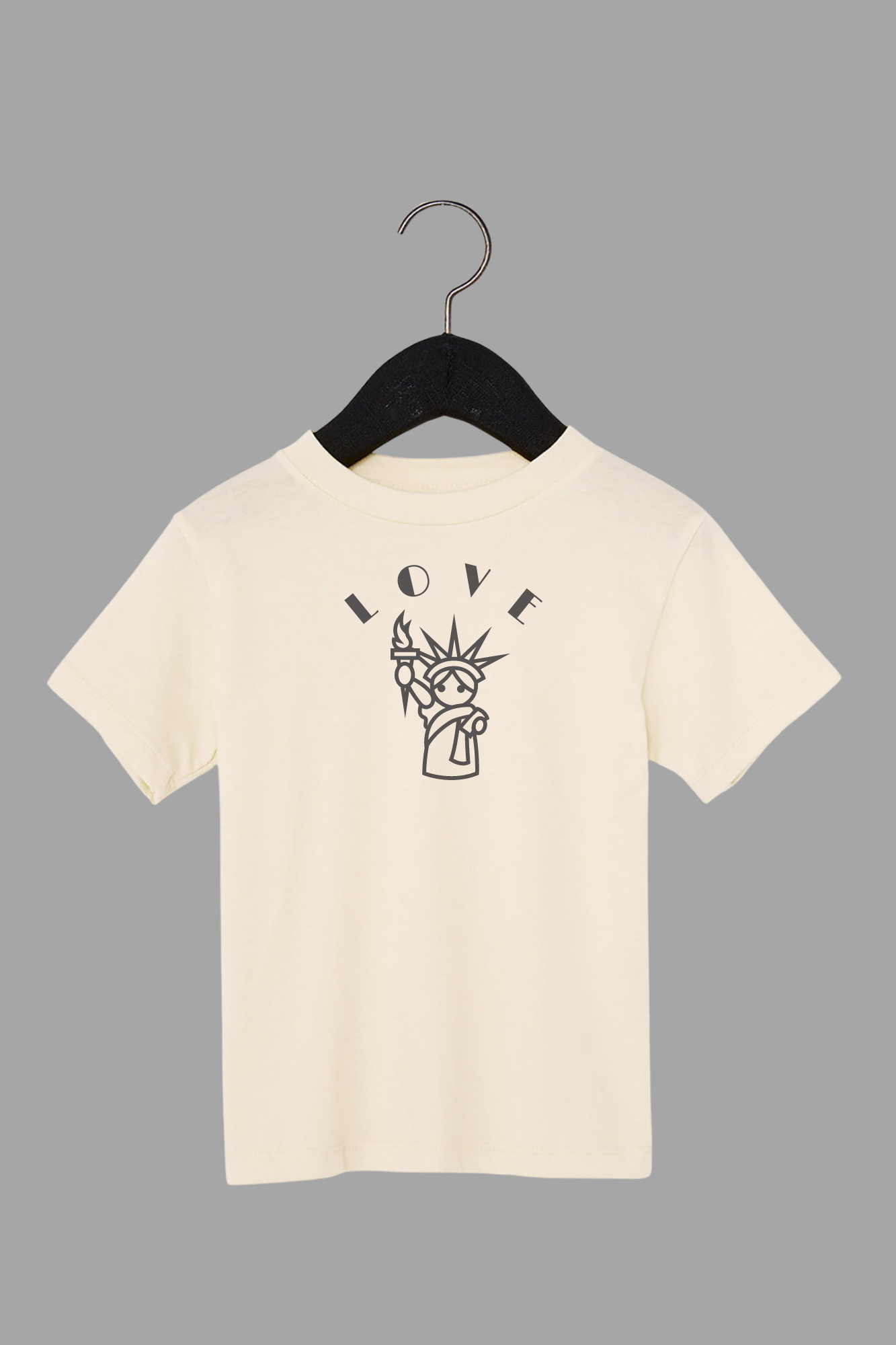 Love is Free Liberty toddler tee in beige - patriotic kindness graphic shirt for kids